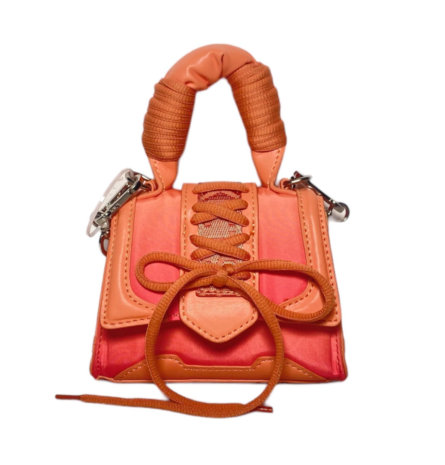 Mini Bolsa Steve Madden en color naranja con diseño moderno y compacto.