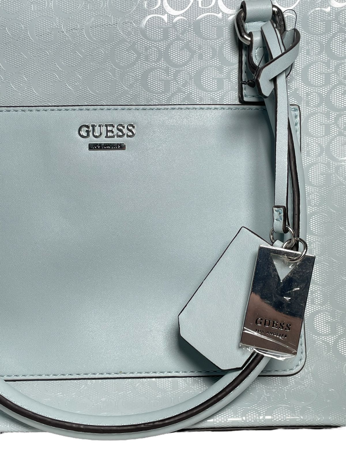 Bolsa Guess Azul Cielo con diseño moderno y elegante.